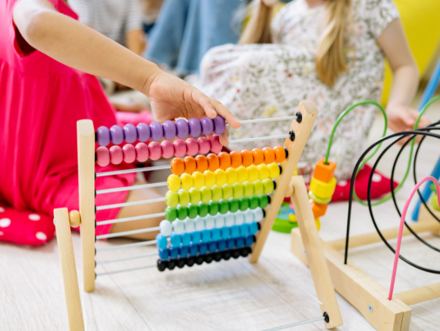 Children Learning Abacus at Joyful Kidz Day Care